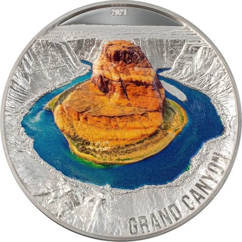 A colorful commemorative coin featuring a raised relief design of the 2021 Palau Seven Natural Wonders: Grand Canyon, celebrating the 2021 Republic of Palau 7 Wonders.