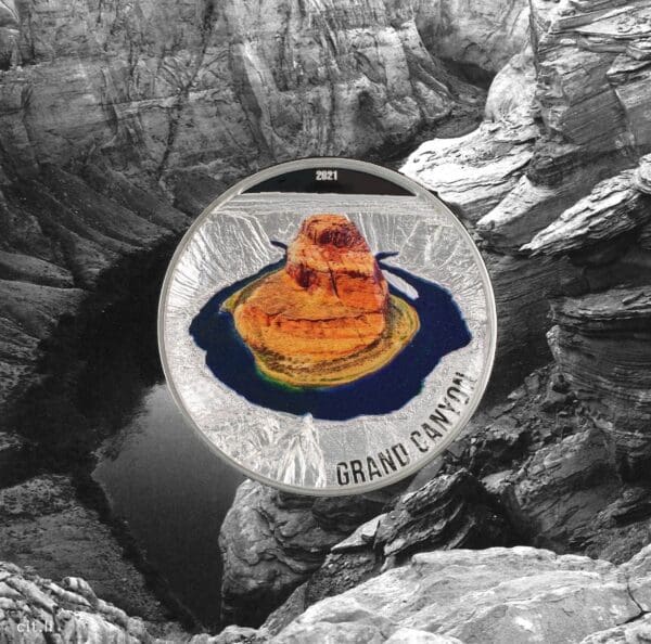 2021 Palau Seven Natural Wonders: Grand Canyon 3oz Proof Silver Coin featuring grand canyon design superimposed on a black and white image of the canyon itself.