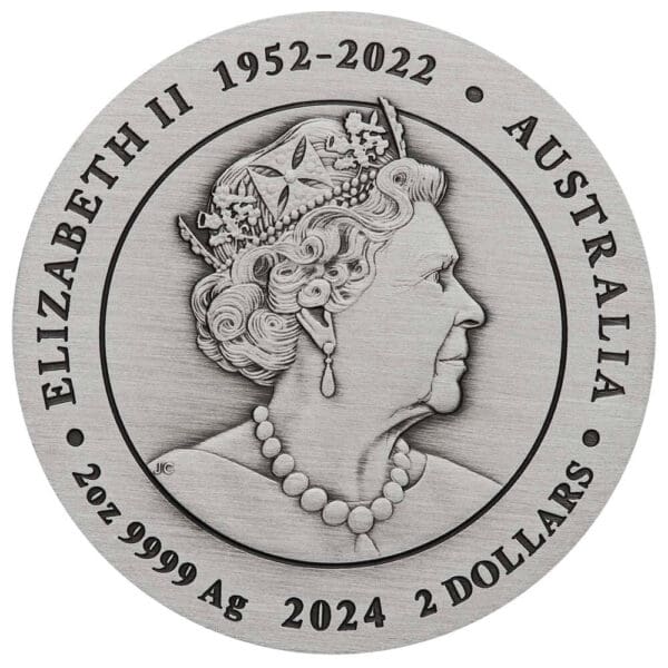 Profile of Queen Elizabeth II on a 2024 Australia Lunar Series III Year of the Dragon 2 oz Silver Antiqued Coin marking her years of reign from 1952 to 2022.